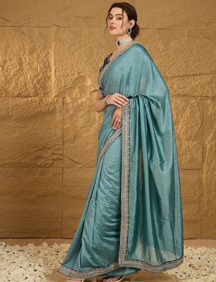 Teal embellished embroidered party wear saree 2