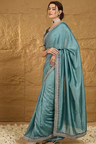 Teal embellished embroidered party wear saree