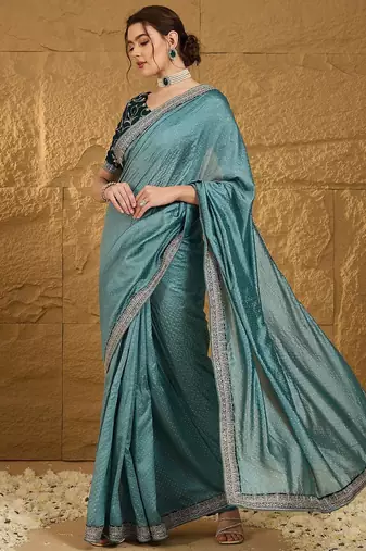Teal embellished embroidered party wear saree