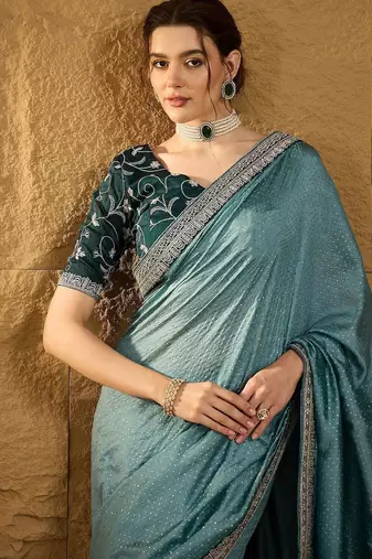 Teal embellished embroidered party wear saree