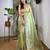 Green embroidered embellished tissue saree