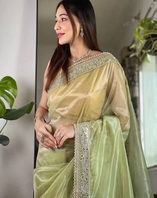 Green embroidered embellished tissue saree 3