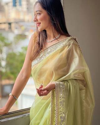 Green embroidered embellished tissue saree 4