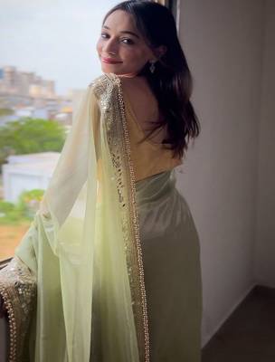 Green embroidered embellished tissue saree 5