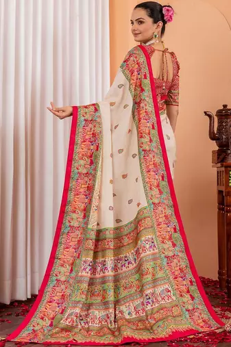 Cream ethnic motifs silk blend saree