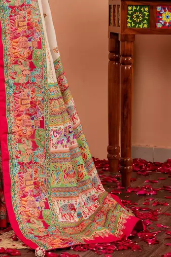 Cream ethnic motifs silk blend saree