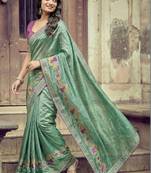Sea green ethnic motifs embroidered silk blend heavy work saree