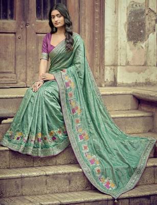 Sea green ethnic motifs embroidered silk blend heavy work saree 4