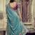 Teal ethnic motifs embroidered silk blend saree