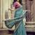 Teal ethnic motifs embroidered silk blend saree