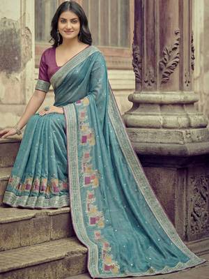 Teal ethnic motifs embroidered silk blend saree 4