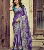 Purple ethnic motifs embroidered silk blend heavy work saree