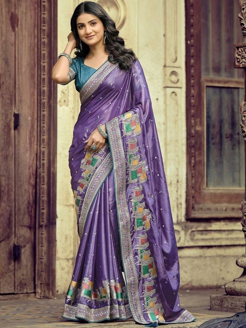 Purple ethnic motifs embroidered silk blend heavy work saree