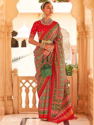 Red ethnic motifs printed ikat saree 1