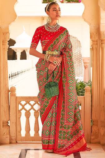 Red ethnic motifs printed ikat saree