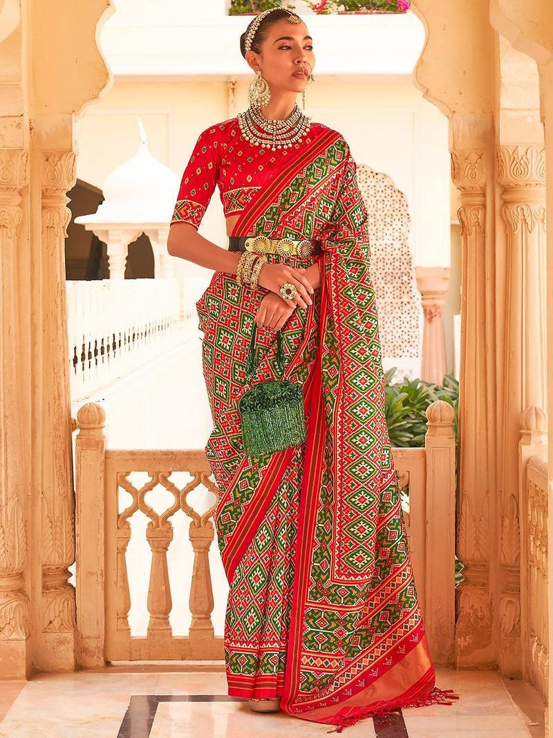 Red ethnic motifs printed ikat saree
