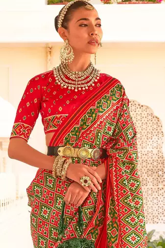 Red ethnic motifs printed ikat saree