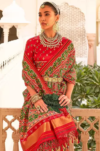 Red ethnic motifs printed ikat saree