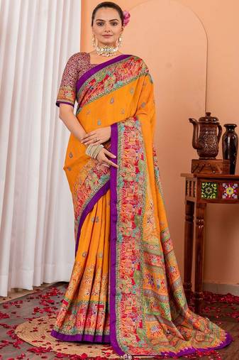 Mustard ethnic motifs silk blend saree