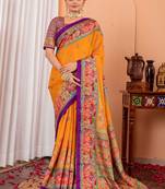 Mustard ethnic motifs silk blend saree