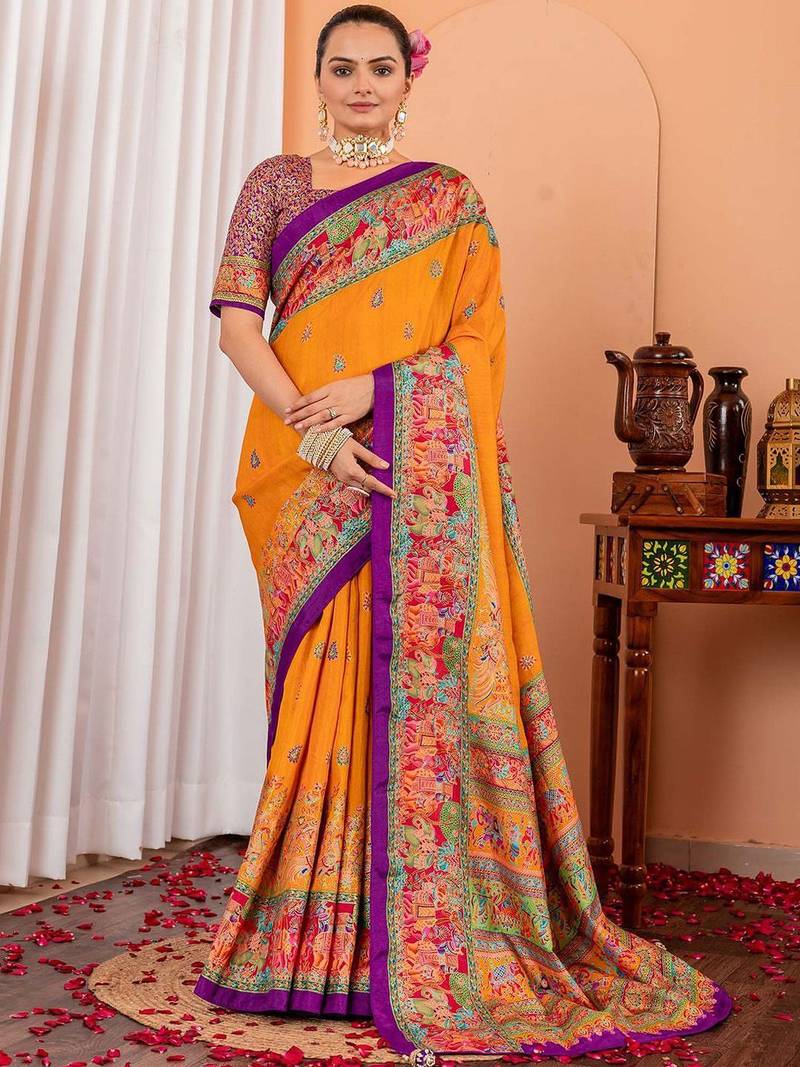 Mustard ethnic motifs silk blend saree