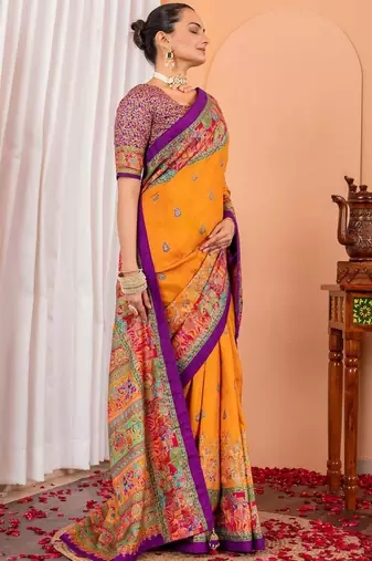 Mustard ethnic motifs silk blend saree