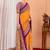 Mustard ethnic motifs silk blend saree