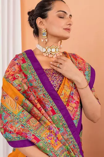 Mustard ethnic motifs silk blend saree