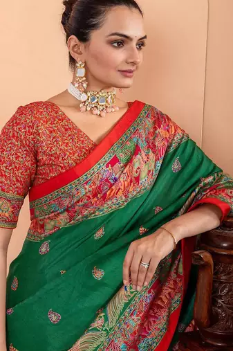 Green ethnic motifs silk blend saree