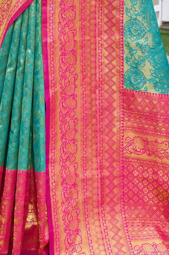 turquoise woven design zari saree