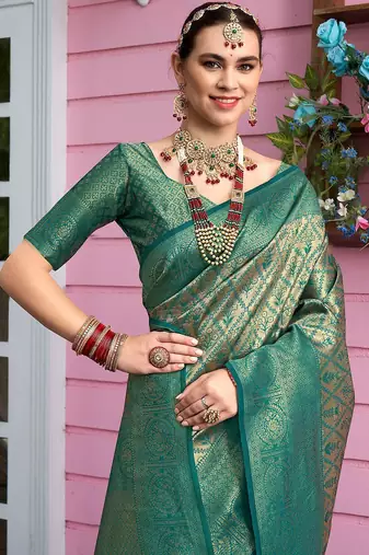 green ethnic motifs woven design zari detail kanjeevaram saree