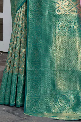green ethnic motifs woven design zari detail kanjeevaram saree