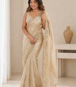 gold ethnic motifs beads and stones satin heavy work saree