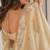 gold ethnic motifs beads and stones satin heavy work saree