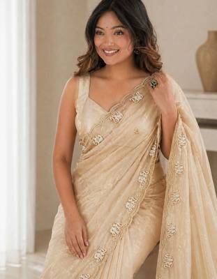 gold ethnic motifs beads and stones satin heavy work saree 3