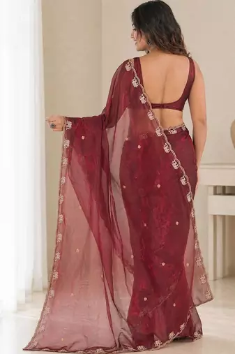 maroon ethnic motifs beads and stones satin heavy work saree