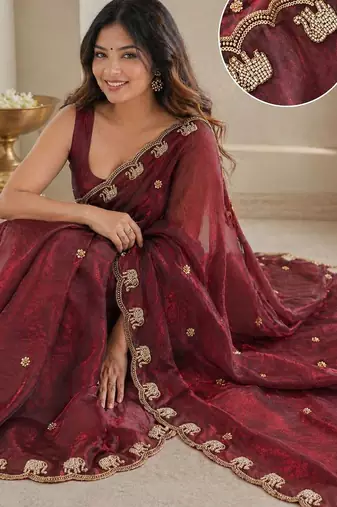 maroon ethnic motifs beads and stones satin heavy work saree