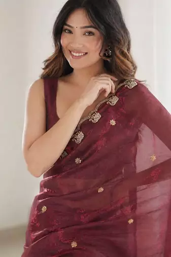 maroon ethnic motifs beads and stones satin heavy work saree