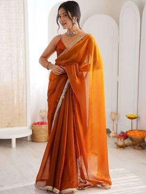 Orange sequinned tissue saree 1