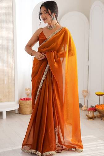 Orange sequinned tissue saree