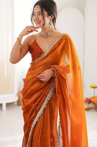 Orange sequinned tissue saree