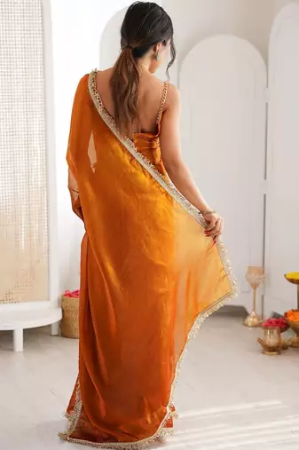 Orange sequinned tissue saree