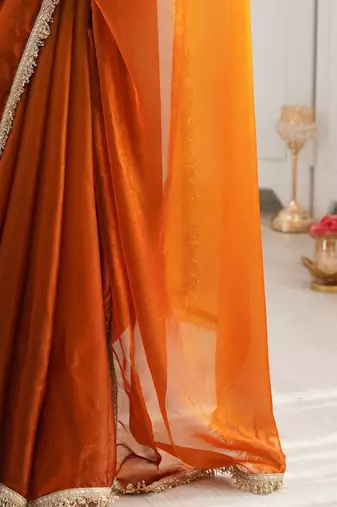 Orange sequinned tissue saree