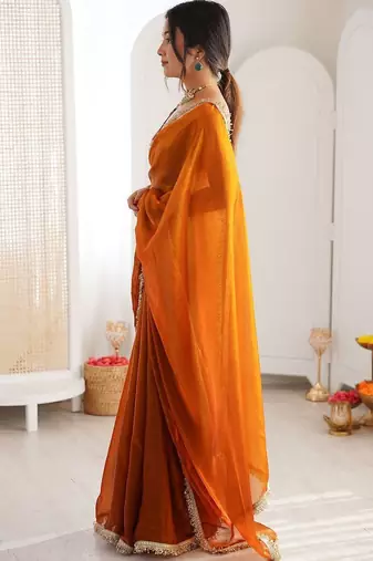 Orange sequinned tissue saree
