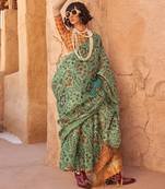 Sea green floral jaali tissue bagru saree