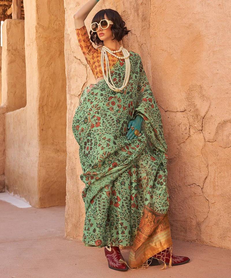 Sea green floral jaali tissue bagru saree