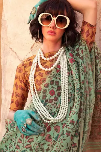 Sea green floral jaali tissue bagru saree