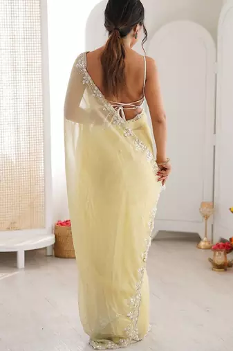 Yellow embellished sequinned  chiffon saree