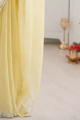 Yellow embellished sequinned  chiffon saree
