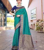 Turquoise turquoise blue & gold-toned ethnic motifs woven design zari banarasi saree